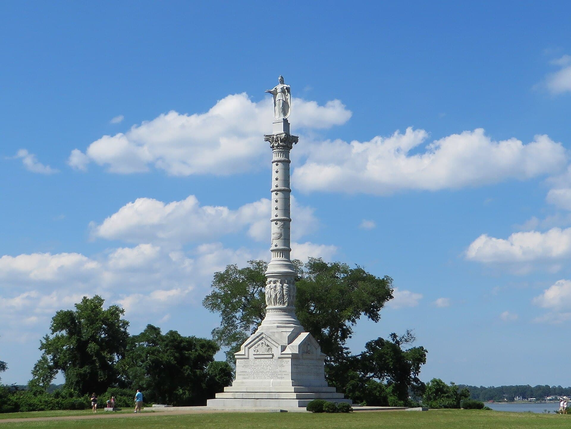 Yorktown Victory Monument rising above a tree-lined lawn in Yorktown, Virginia