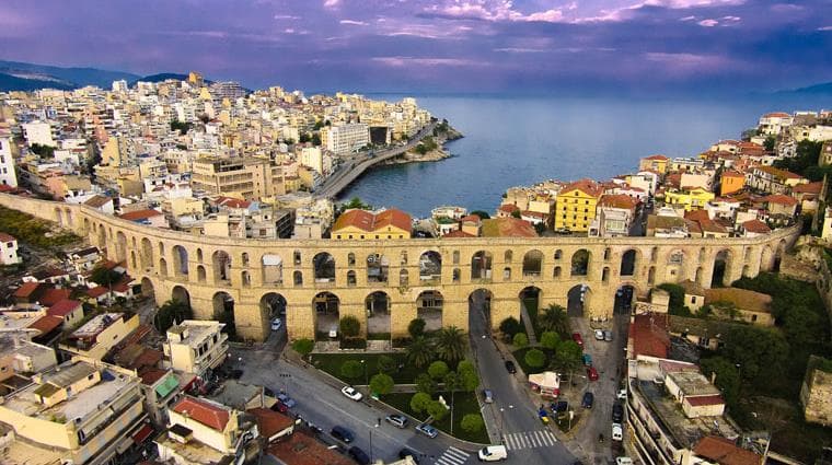Aerial view of Kavala, Greece, with its historic aqueduct and Aegean waterfront