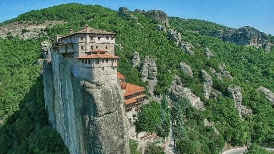A monastery perched high on a narrow rock at Meteora