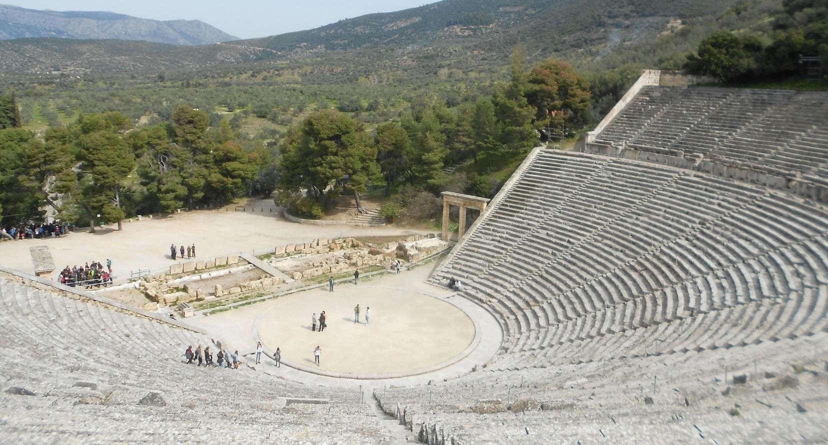 Stone seating and circular orchestra of the ancient theatre at Epidaurus