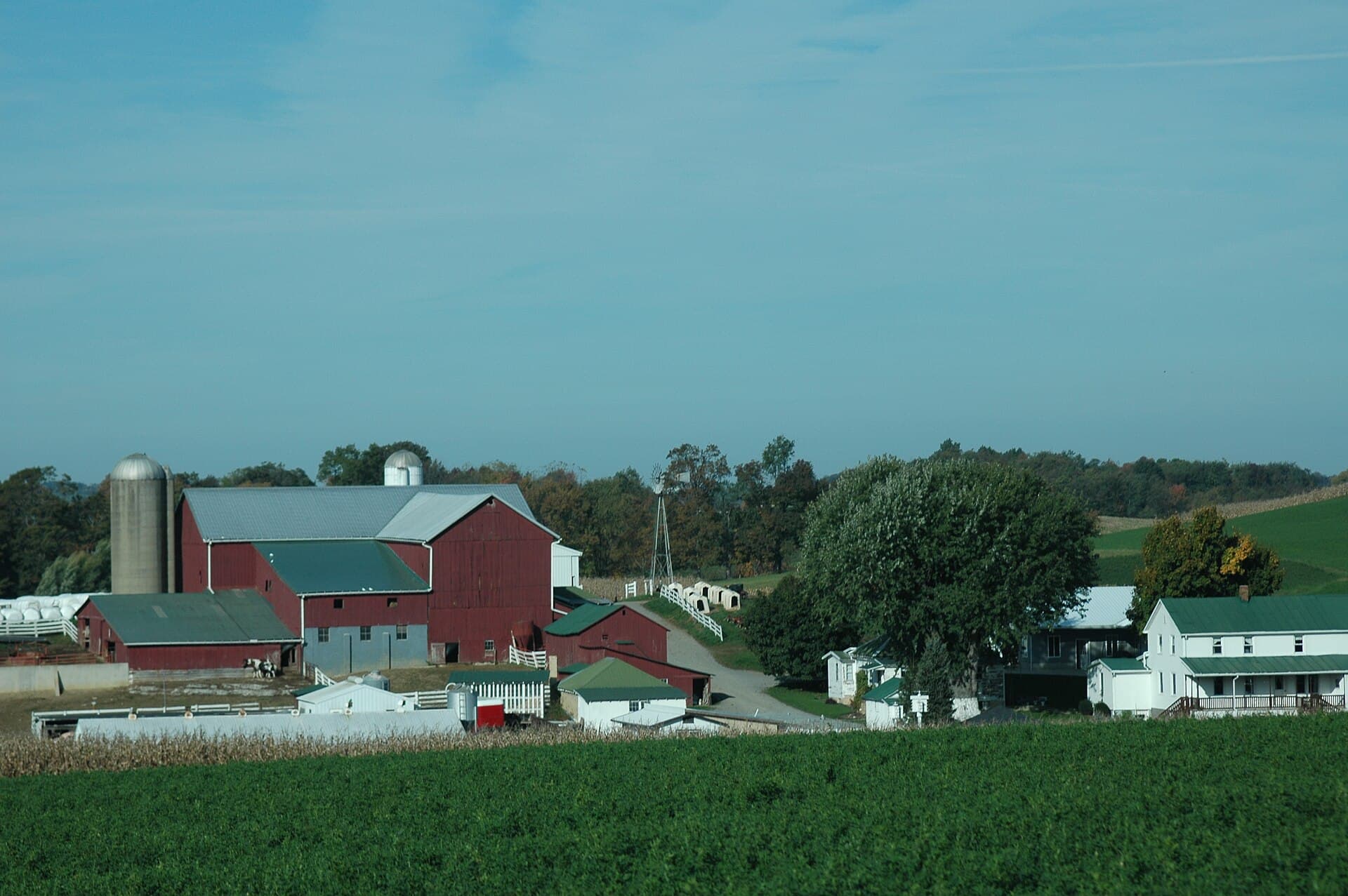 Working Amish farm with barns and silos along the Amish Country Byway in Holmes County
