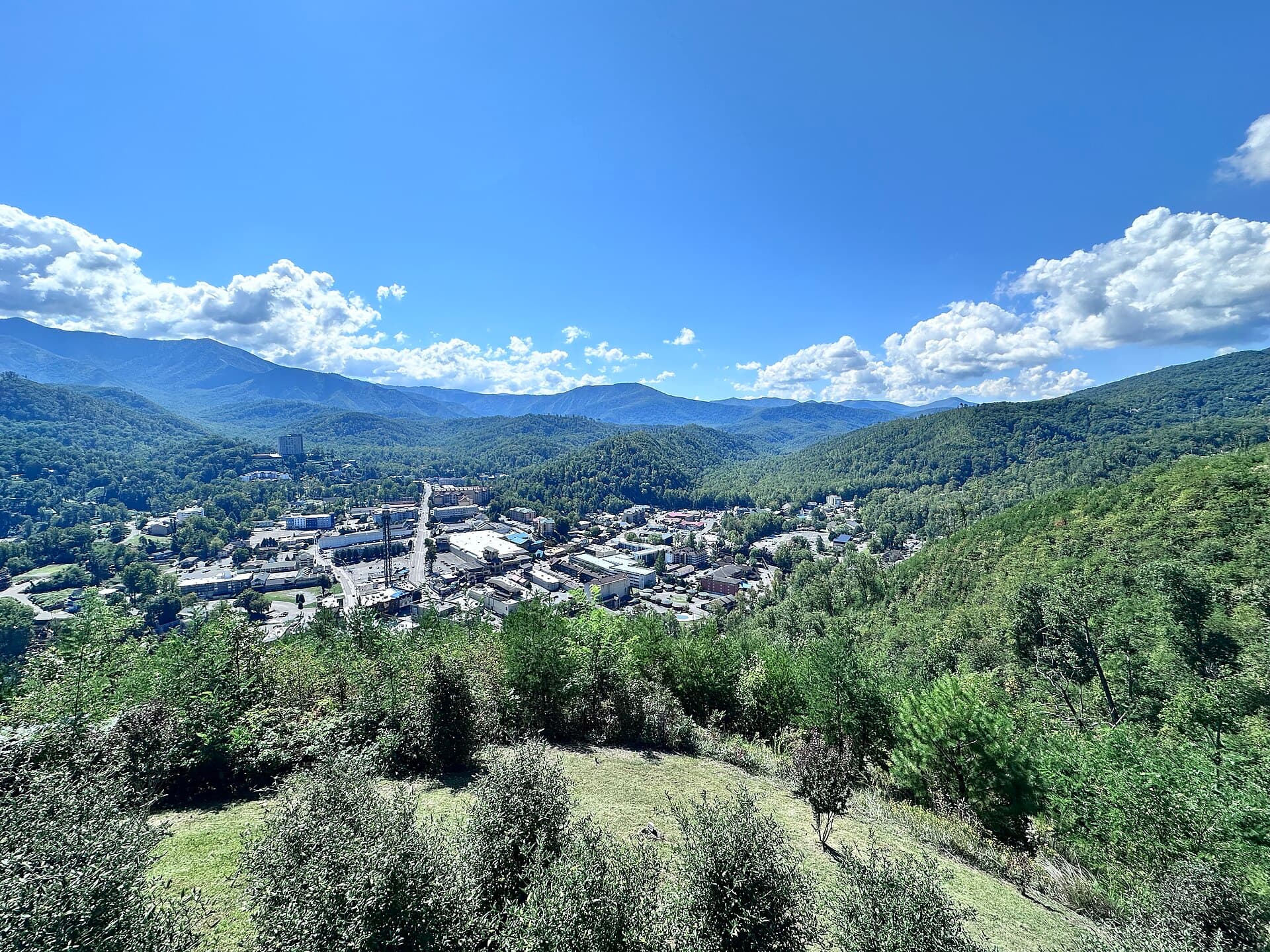 Downtown Gatlinburg seen from Gatlinburg SkyPark with the Great Smoky Mountains rising behind the town