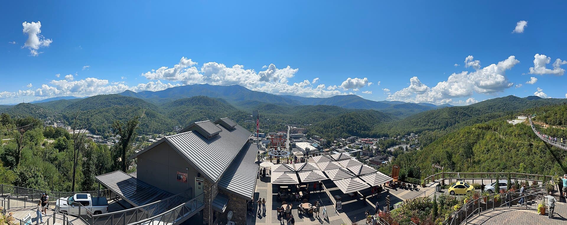 Visitors at Gatlinburg SkyPark overlooking downtown Gatlinburg and the surrounding mountains