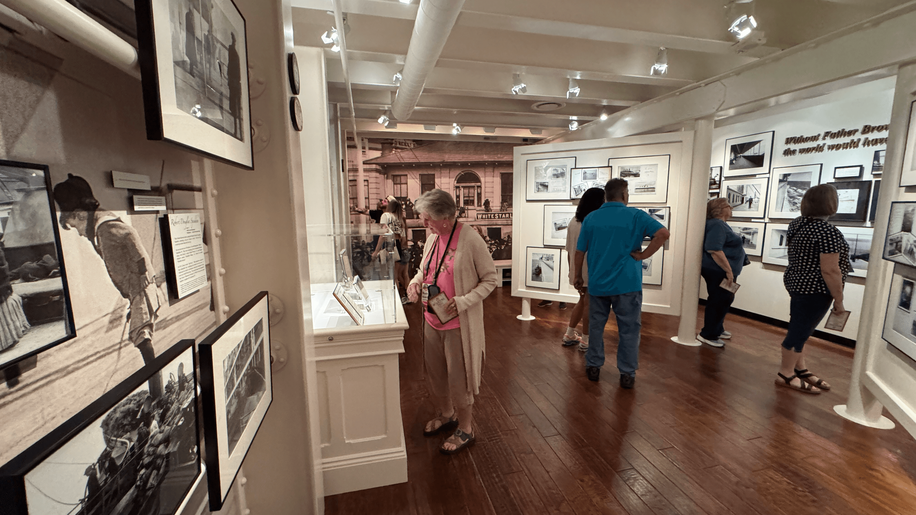 Great Falls Travel guests exploring passenger stories and artifacts inside the Titanic Museum Attraction
