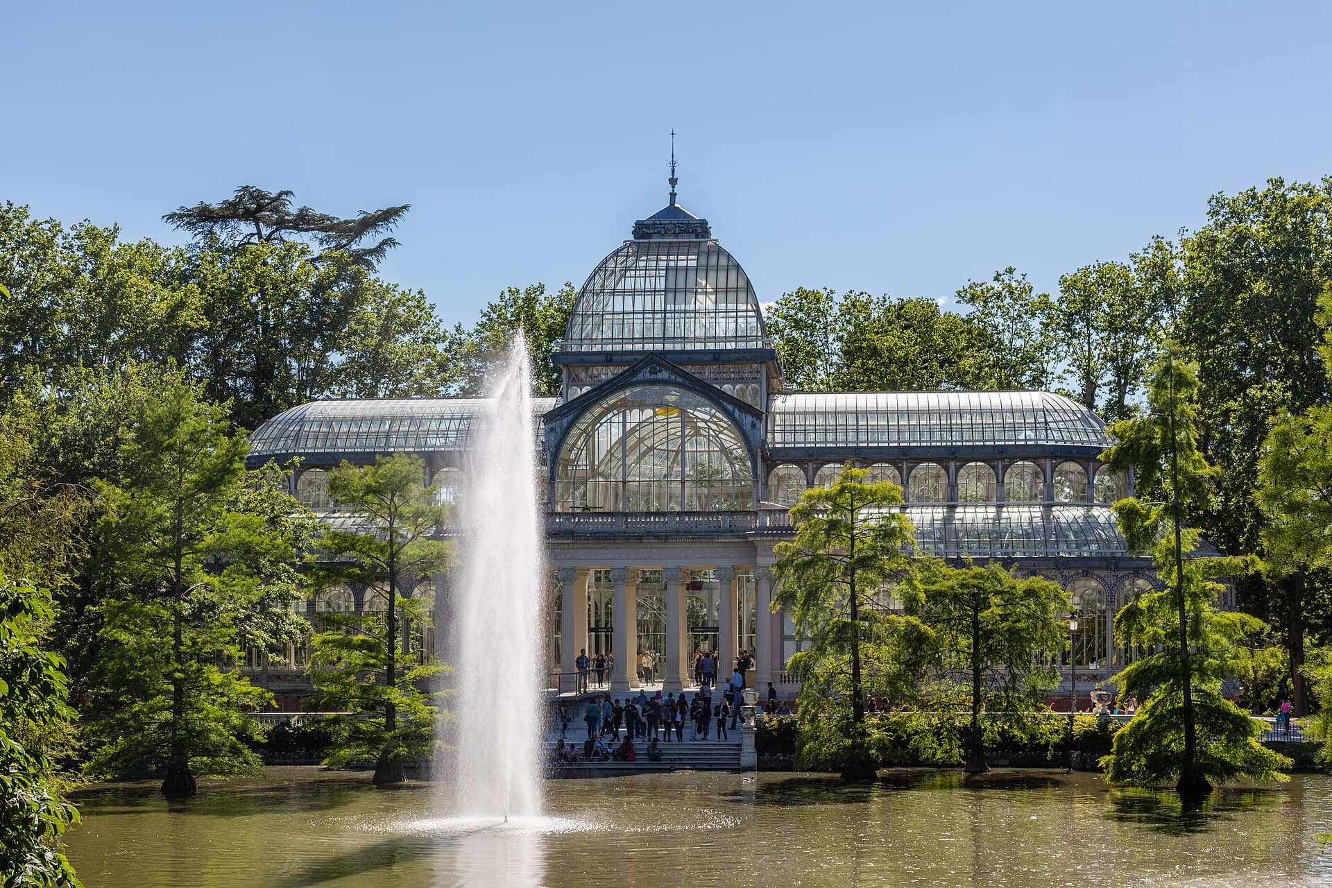 Palacio de Cristal and its fountain in Madrid's Retiro Park